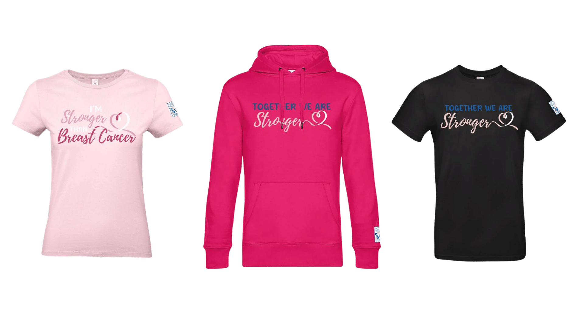 Vaaleanpunainen t-paita, jossa teksti "I'm stronger than breast cancer" sekä fuksia huppari ja musta t-paita, jossa teksti "Together we are stronger"